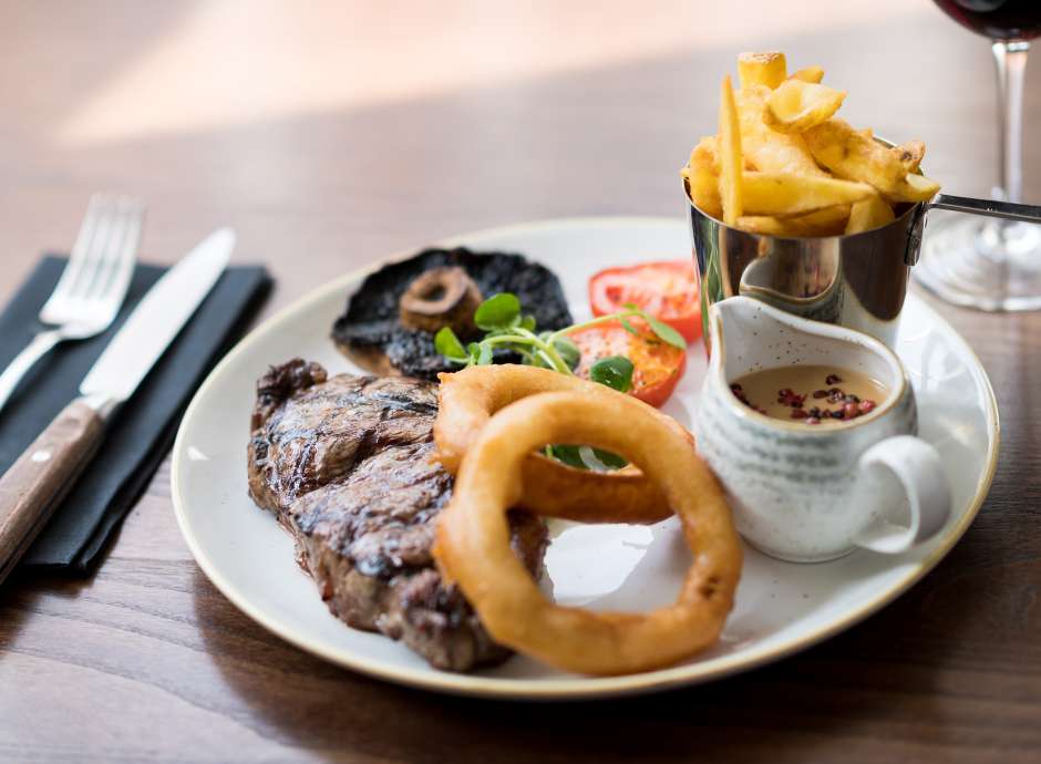 steak, chips and onion rings